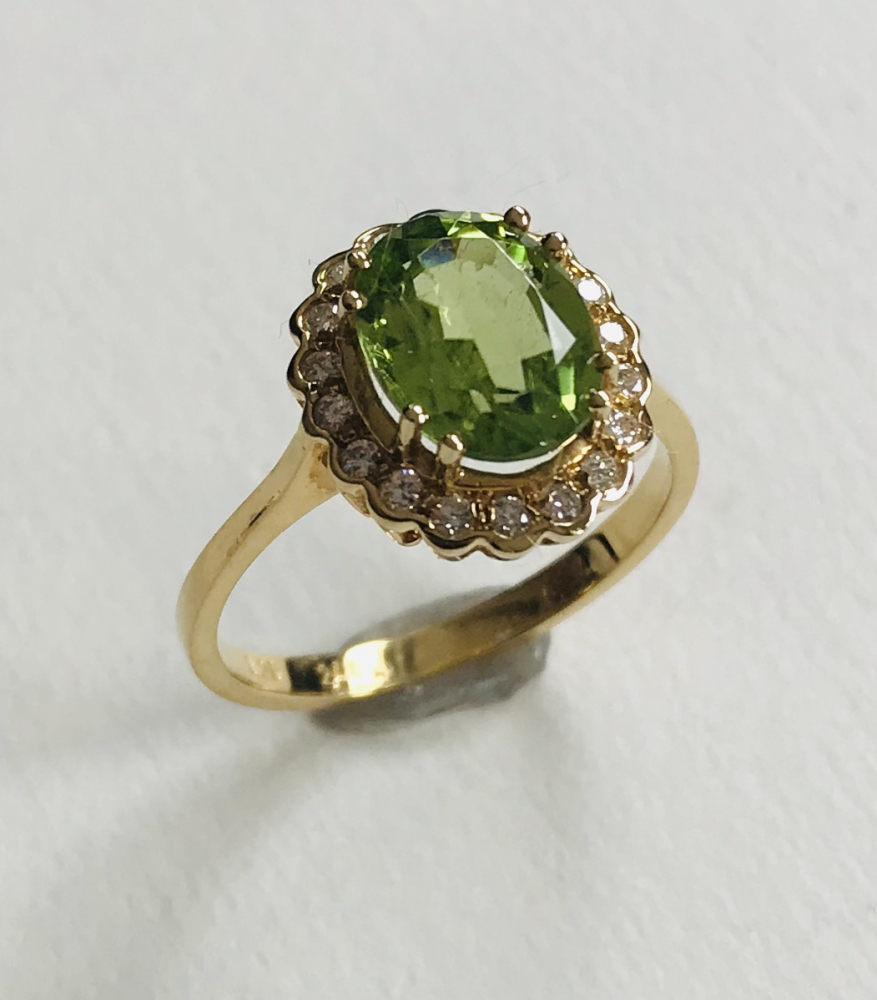 Perydot Brill. Ring 750 GG